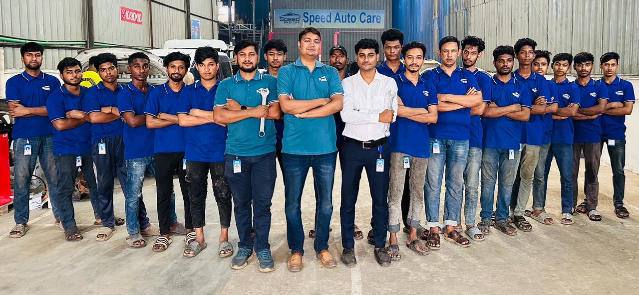 The Speed Auto Care team — technicians and management at the Notunbazar workshop